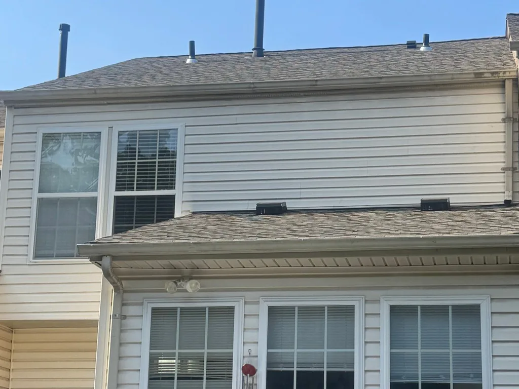 New asphalt shingle roof on a townhome building, commercial roofing