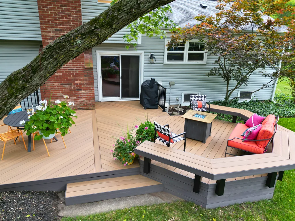 Finished two tone composite deck with built in bench seating, deck builder